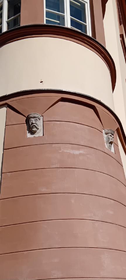 J. Králová: Maskarony, Dolní nám. Olomouc